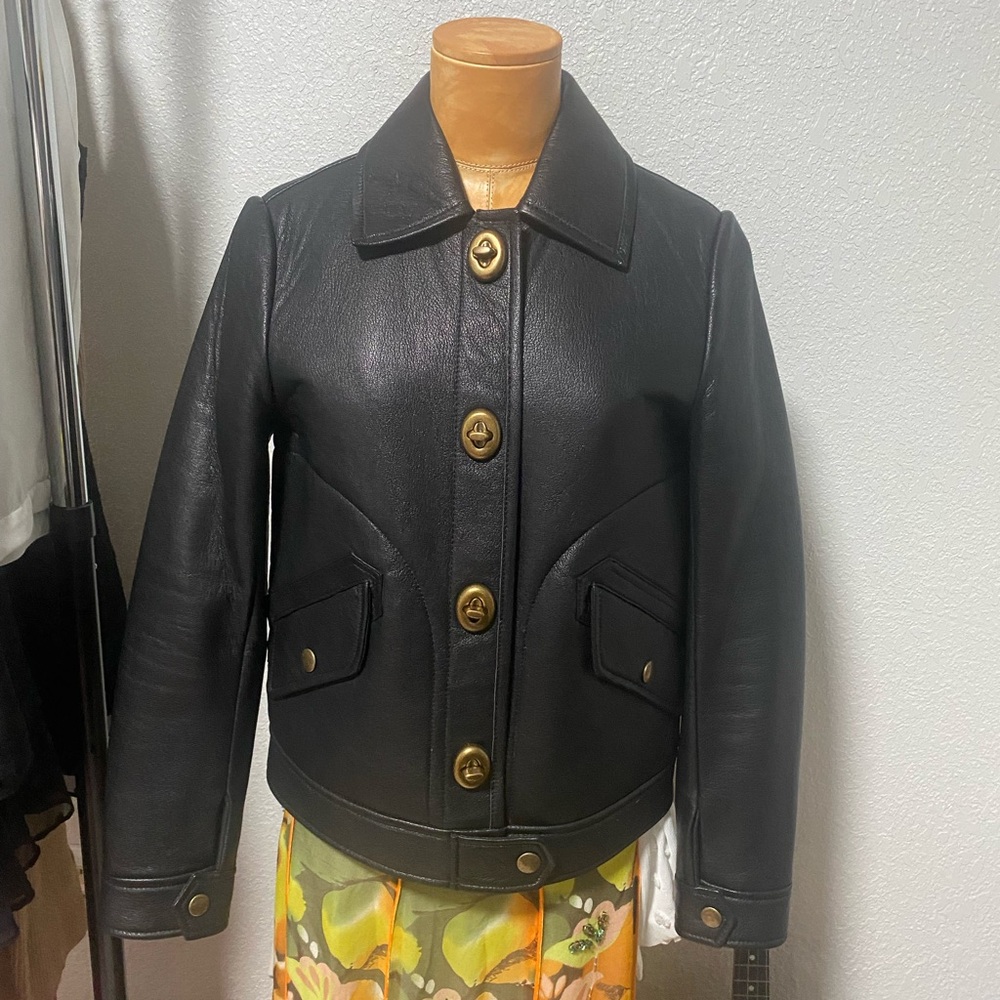 NWT coach bonded leather jacket , size 0  and black color.